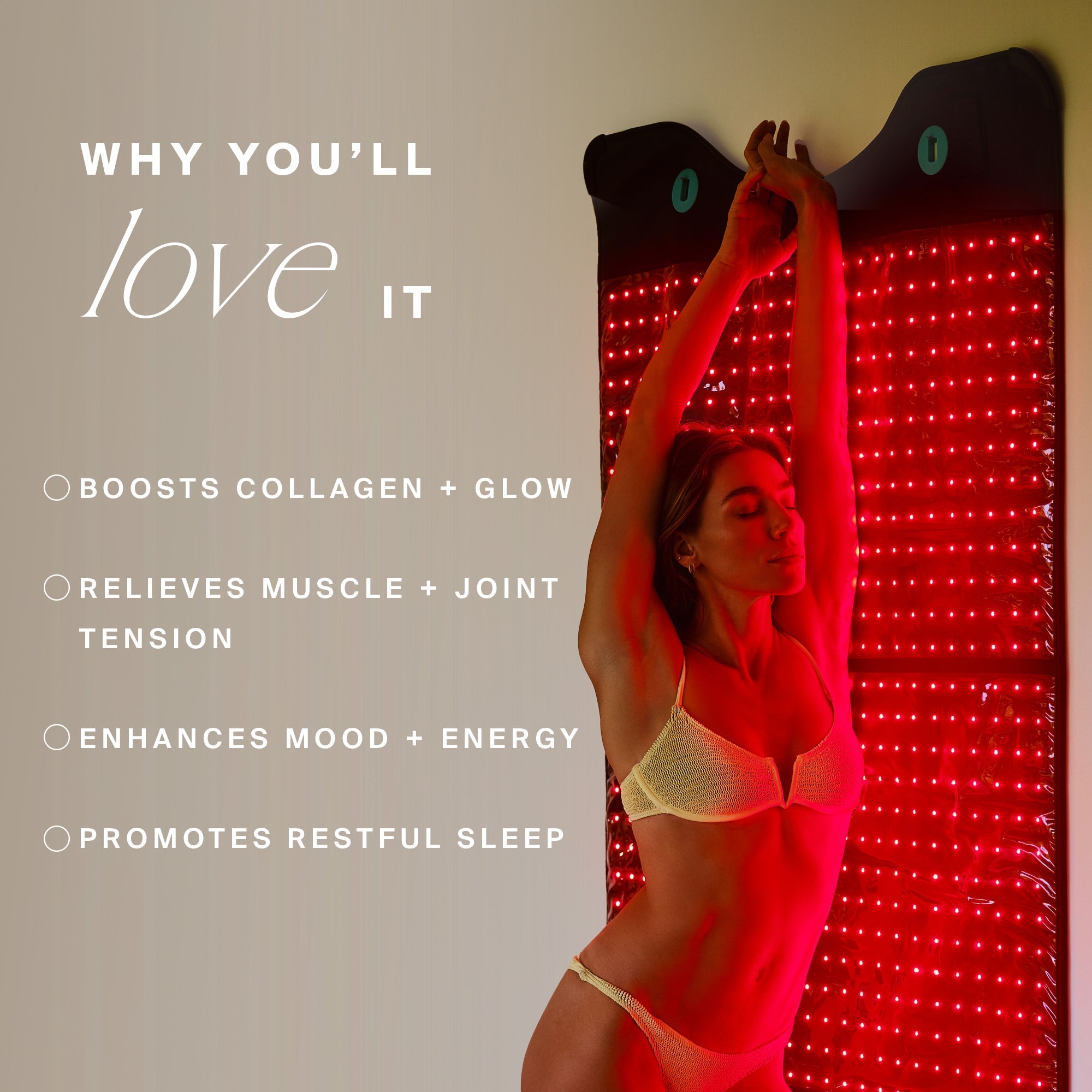 Full Body Red Light Mat mounted on wall illuminated while person stands in front