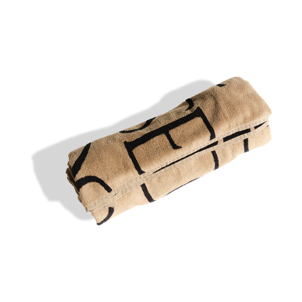 Jacquard Sauna Blanket Insert rolled up showing woven textile pattern