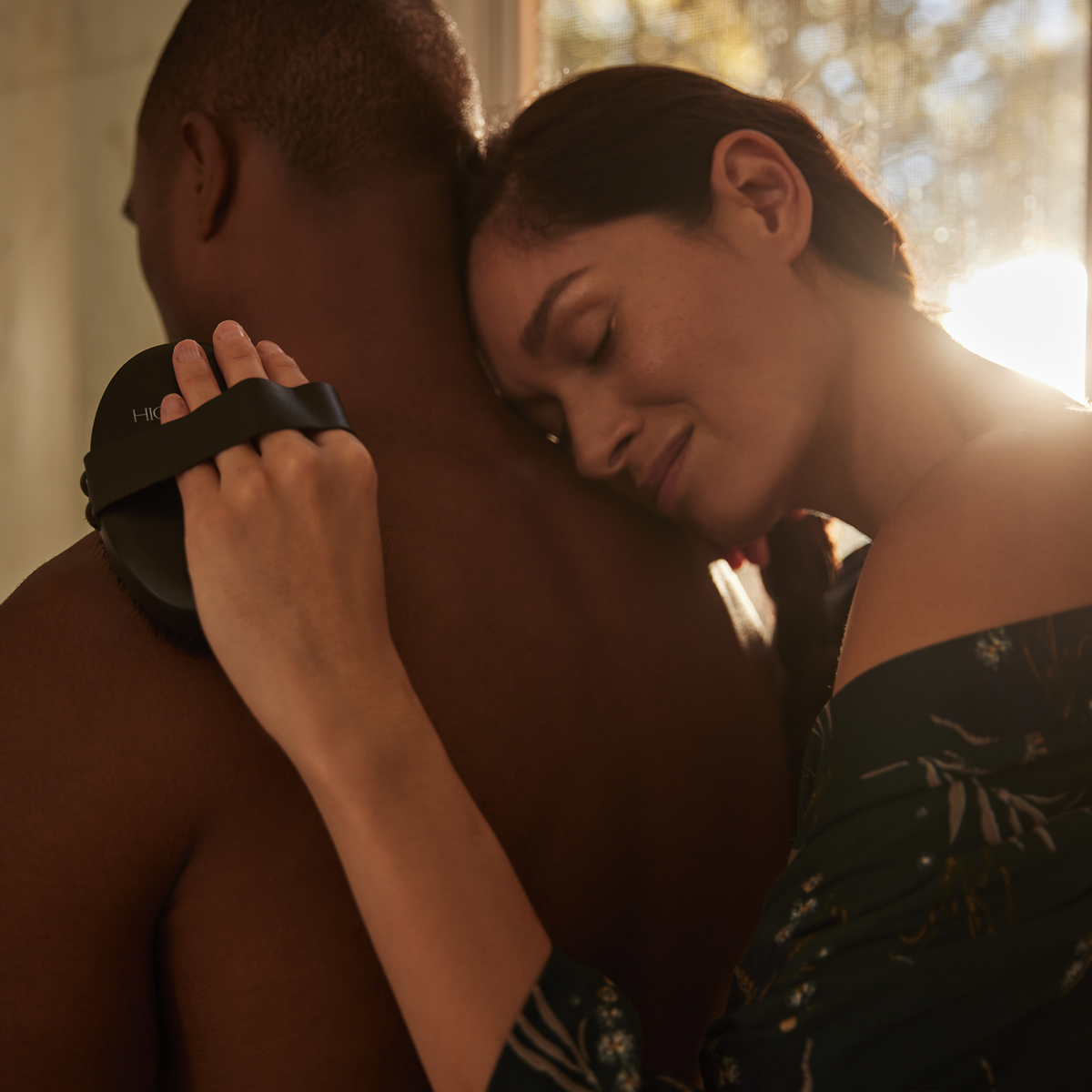 Copper Body Brush being used on shoulder